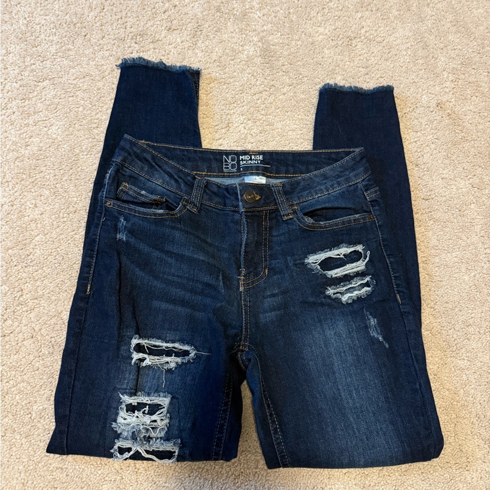 Skinny mid rise ripped jeans